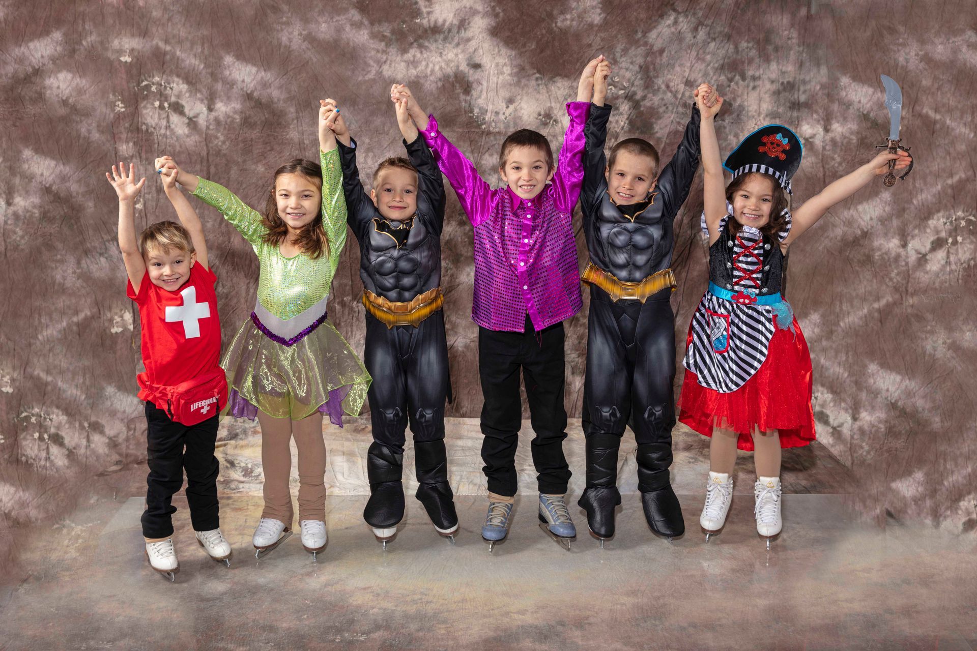 Local Halloween figure skaters