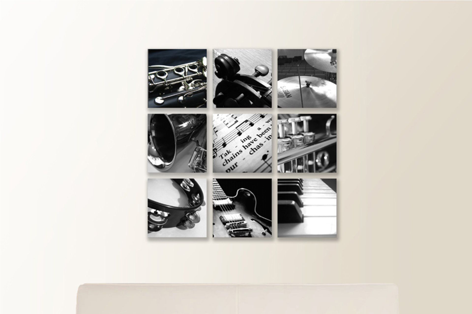 Wall of black and white cluster canvas prints.