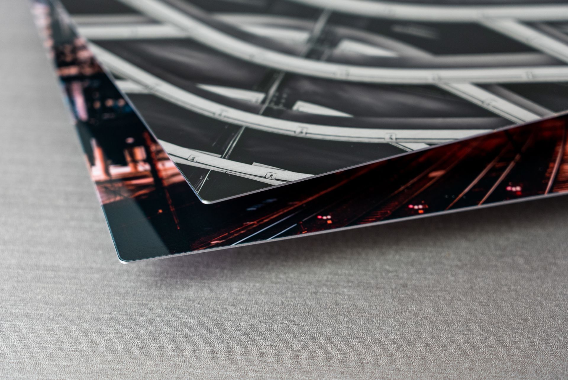Side shot of 2 aluminum prints showing their thickness
