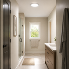 Modern bathroom with walk-in shower, vanity, window, and neutral decor