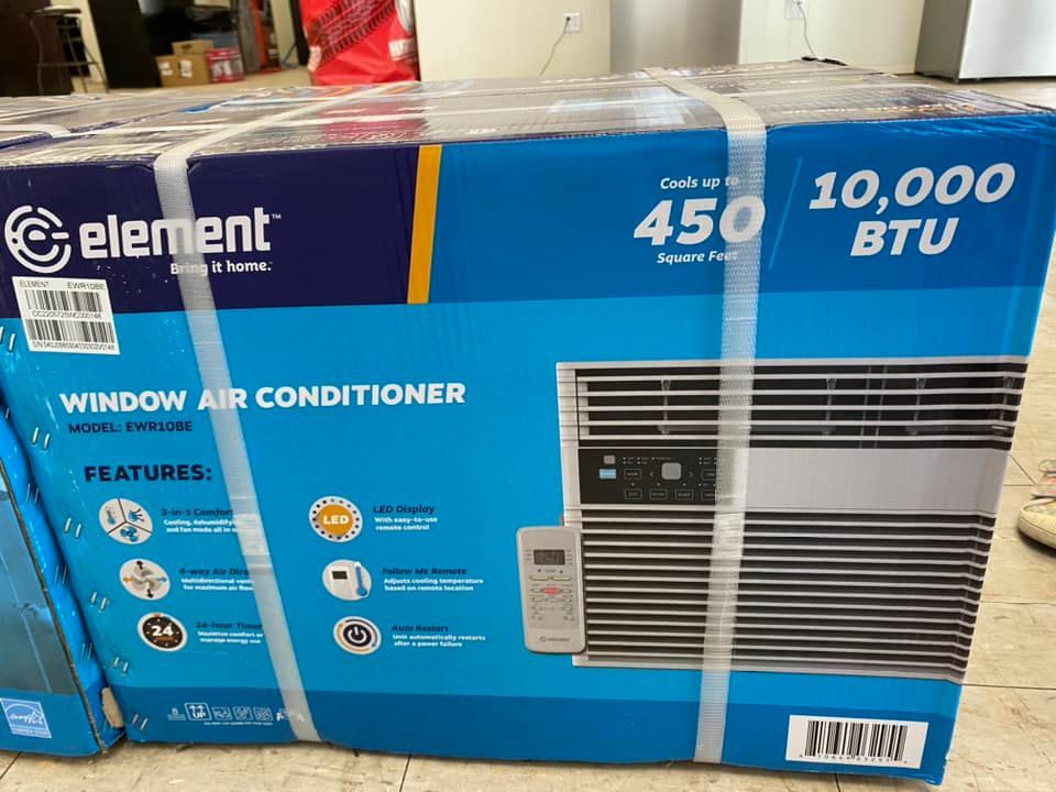 Element 450 sq. ft. 10,000 BTU window air conditioner box on a store shelf, blue packaging