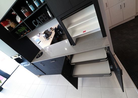 A kitchen with a sign that says cafe on it.