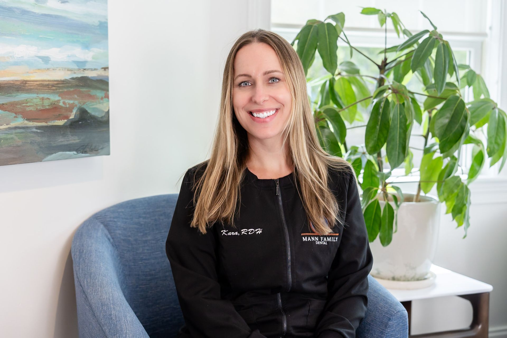 Kara, our dental hygienist, in the lounge at Mann Family Dental