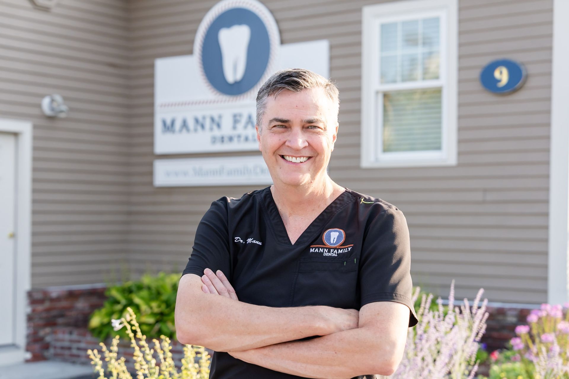 Dr. Russell Mann outside Mann Family Dental, a dentist in Manchester, NH