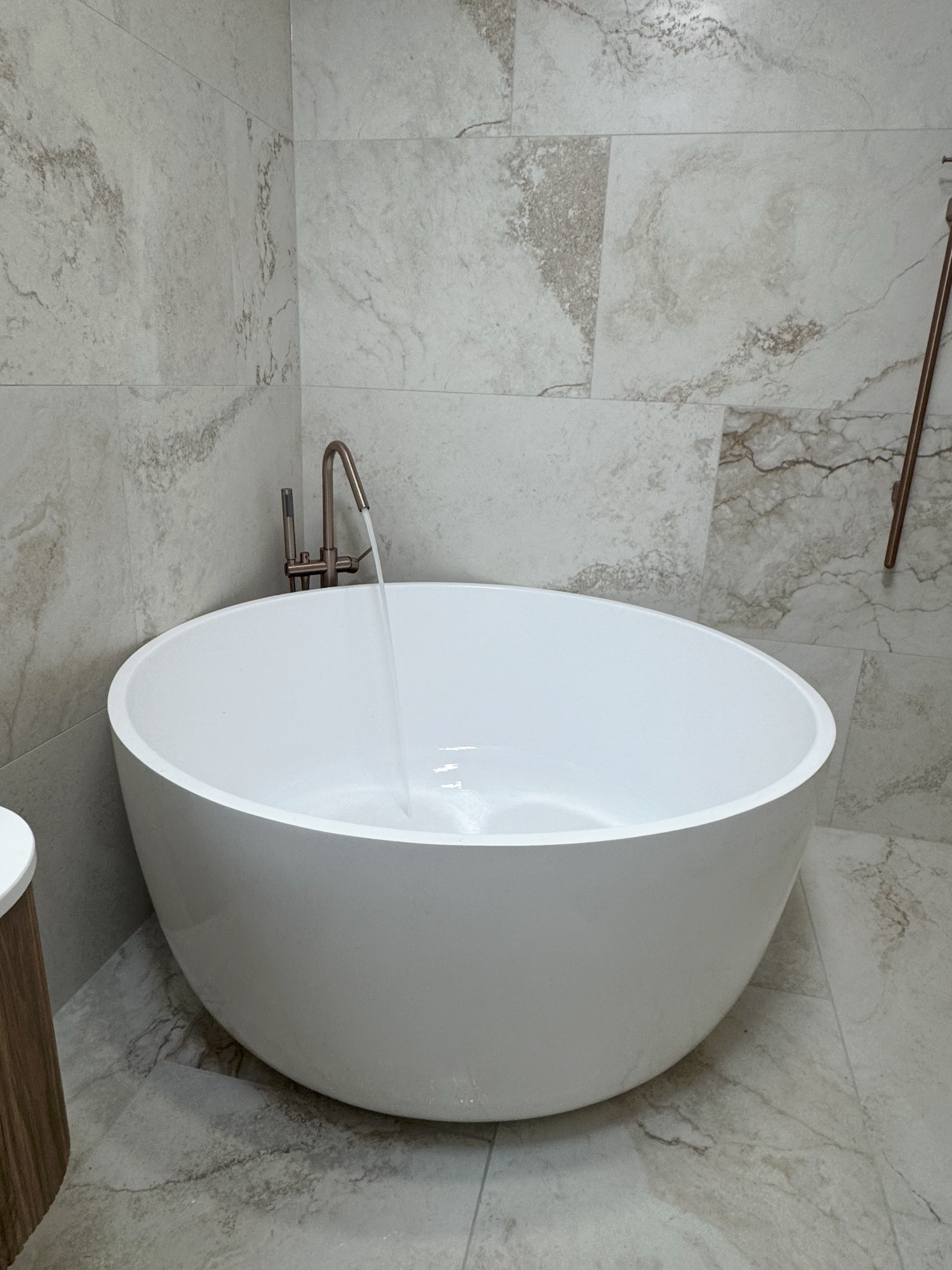 Bathtub With Running Water — Fair Plumbing In Kembla Grange, NSW