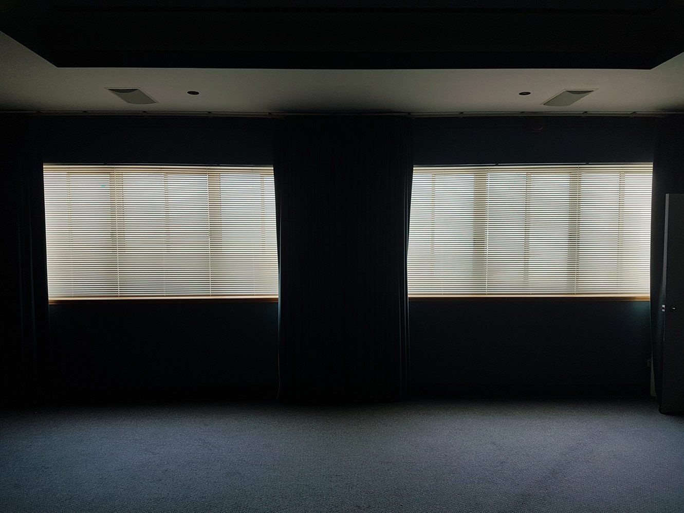 Dim Room With Blinds — Blinds Installation in Winnellie, NT