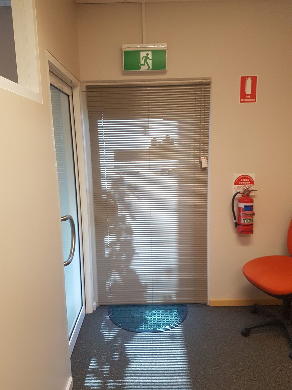 Doors With Exit Sign — Blinds Installation in Winnellie, NT