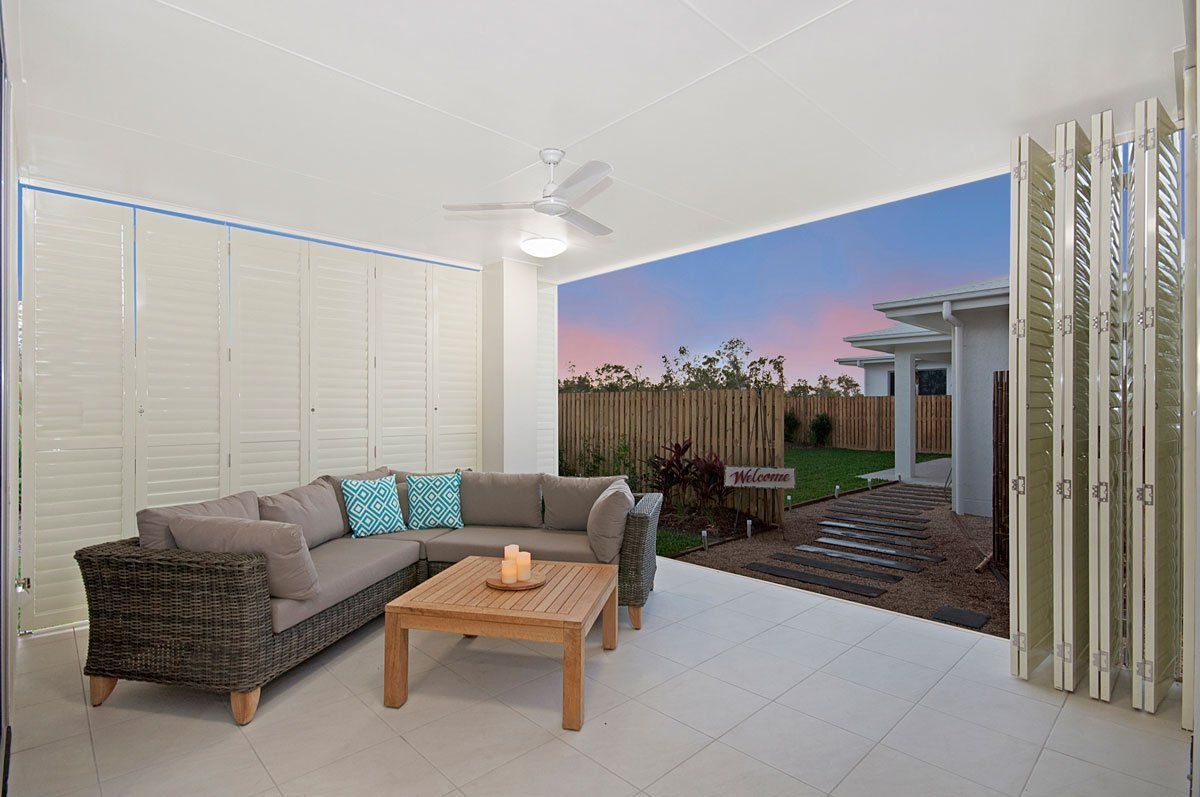 Opened Sliding Plantation Shutters in Living Room — Blinds Installation in Winnellie, NT