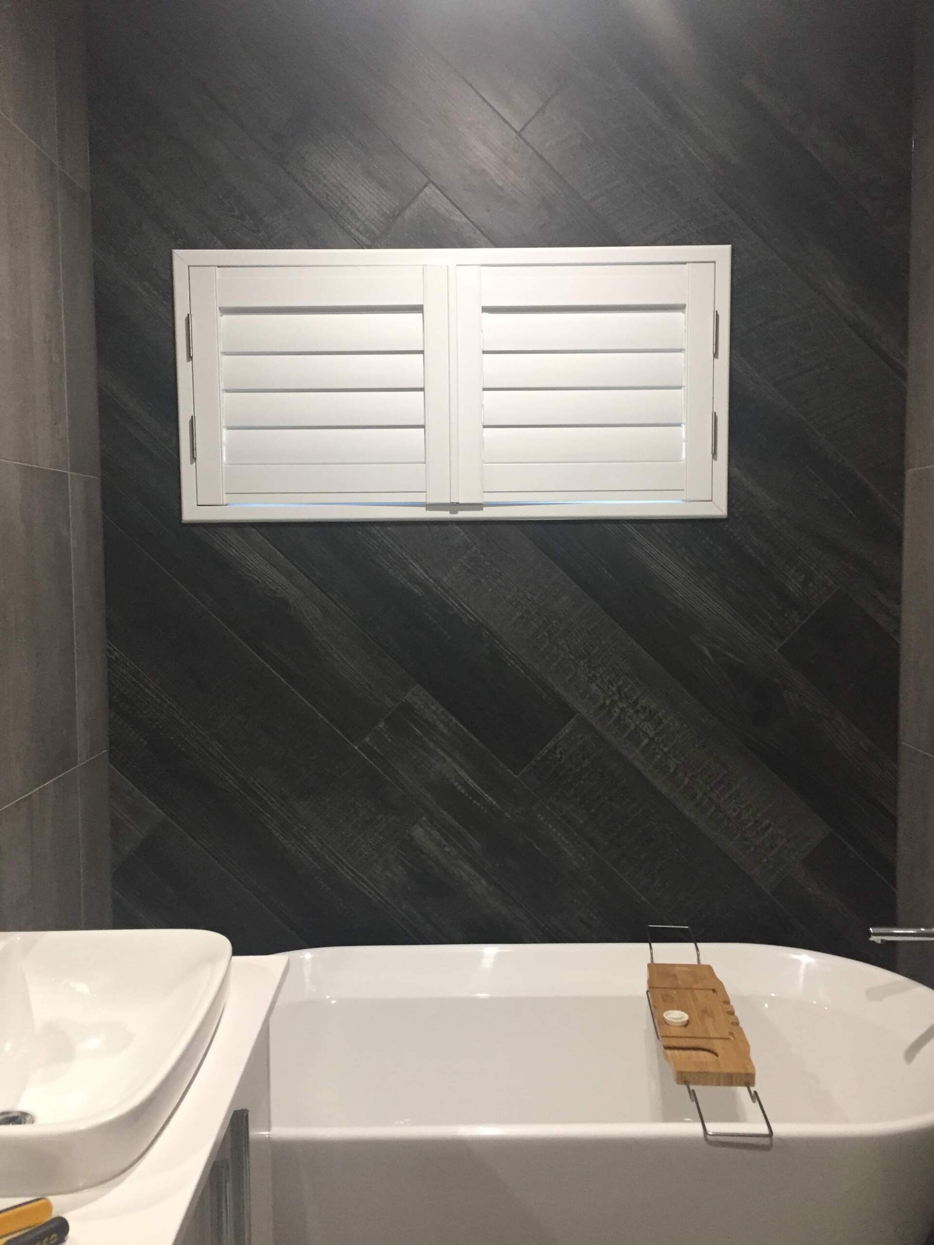 Plantation Shutters In Bathroom — Blinds Installation in Winnellie, NT