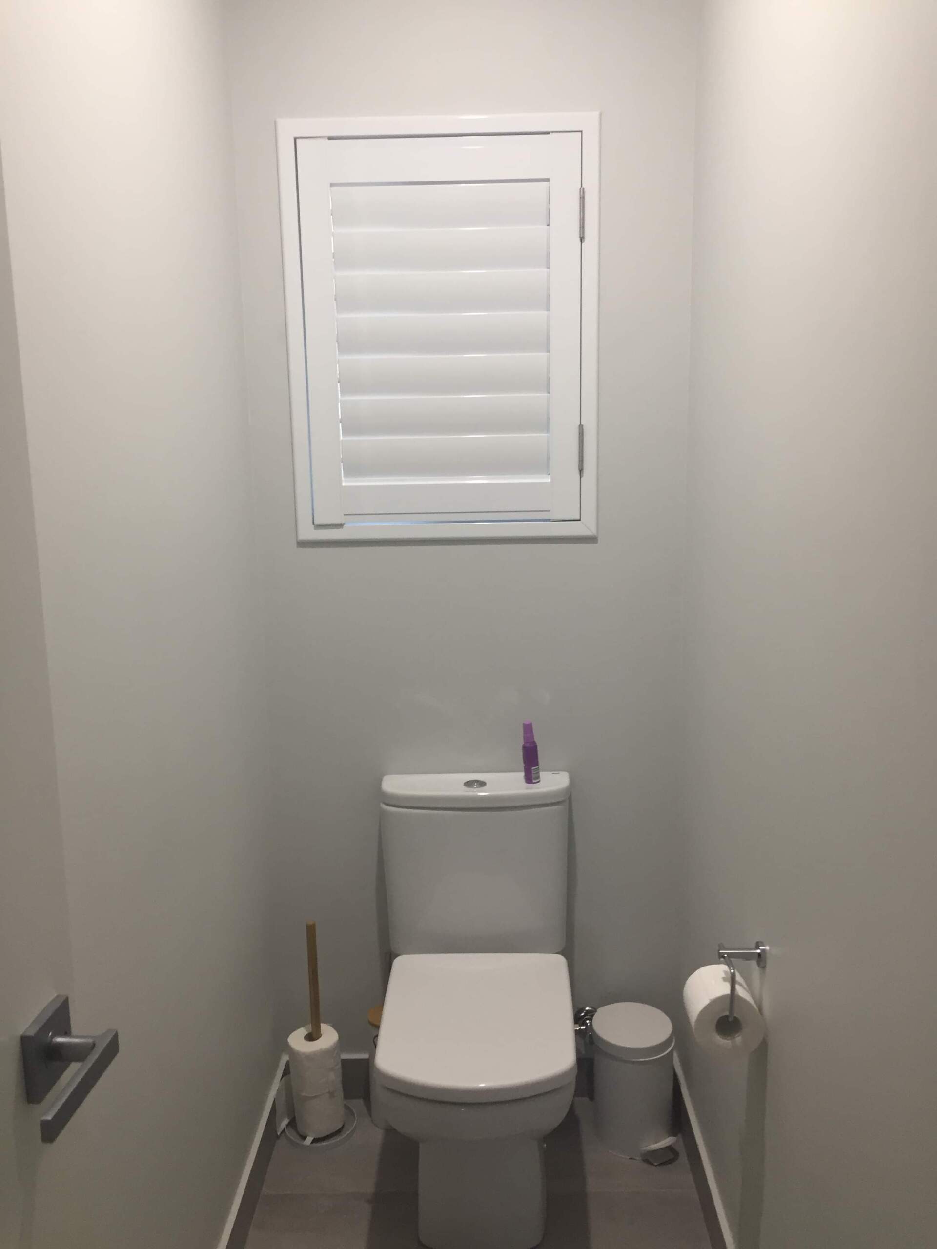 Plantation Shutters In Toilet — Blinds Installation in Winnellie, NT