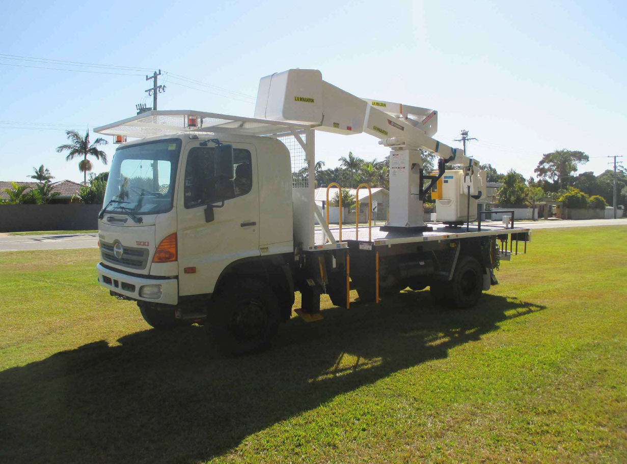White Flatbed Utility Truck With Crane Parked — Lifters Hire in Cambridge, TAS
