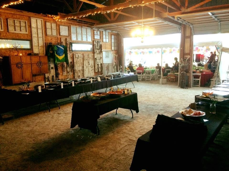 A large room filled with tables and plates of food.