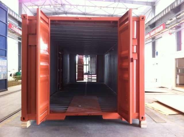 Open orange shipping container interior view.