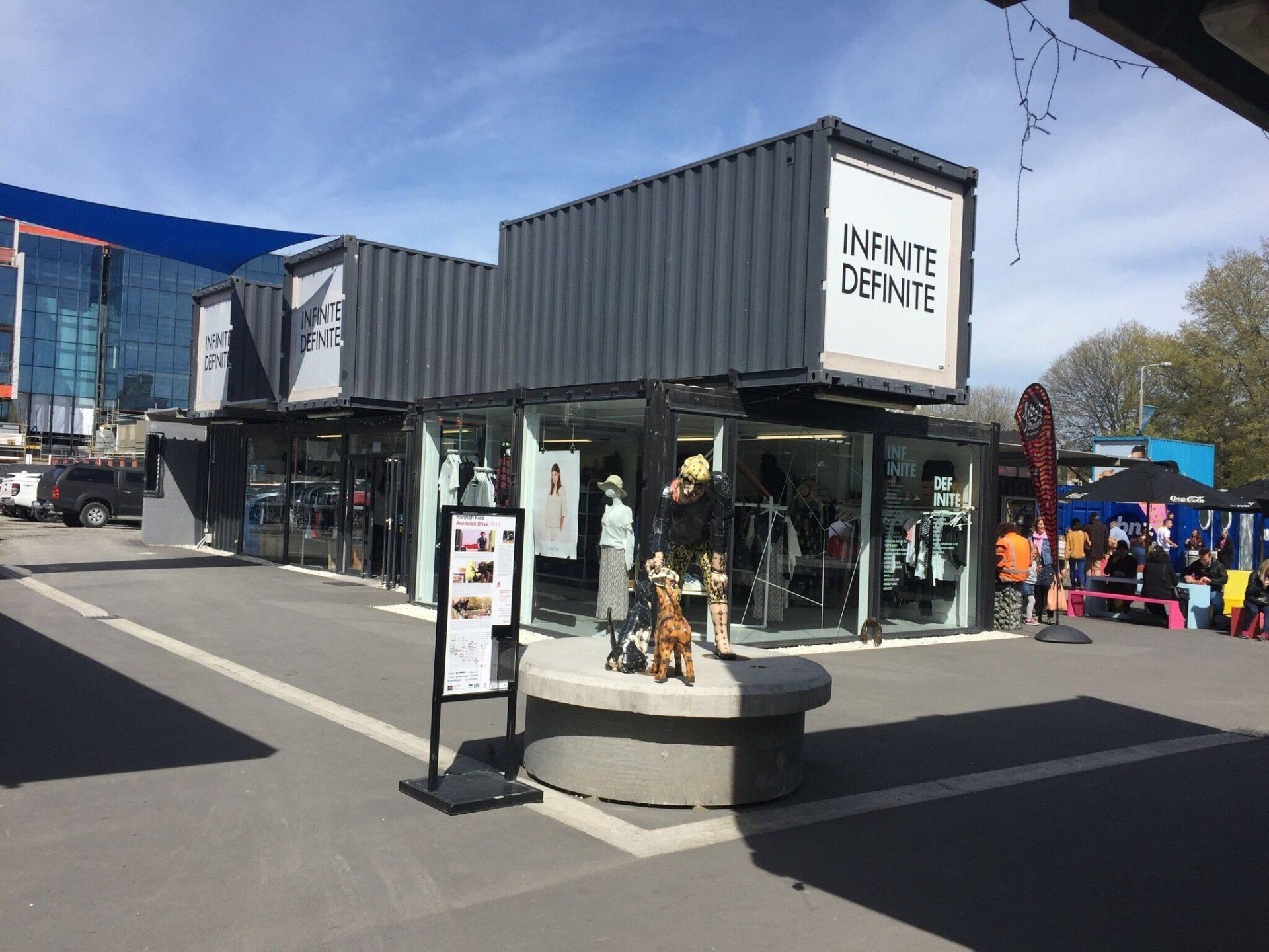 Shipping container shops with glass fronts,