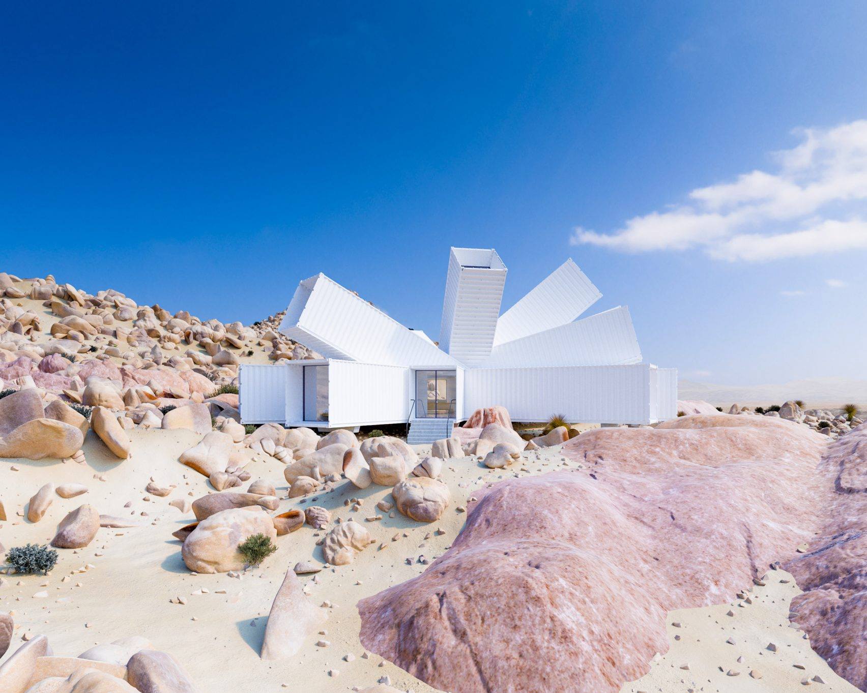 White, angular house in desert landscape. Exterior features large, protruding sections; blue sky, tan rocks, and some sparse vegetation.
