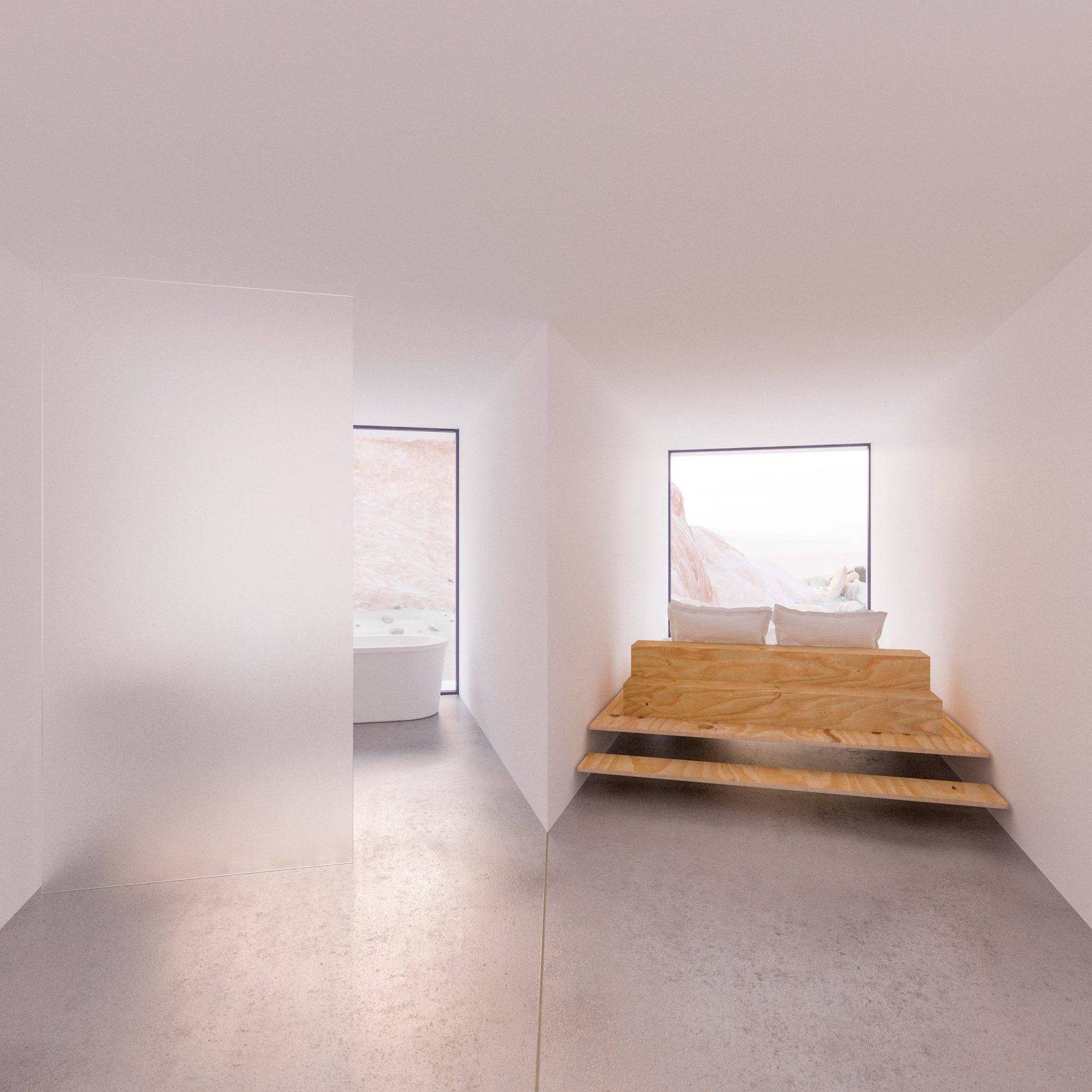Modern white interior with window seat and view of the landscape.