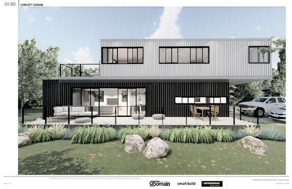 Modern two-story house built from shipping containers. Black and white exterior, with outdoor seating and landscaping.