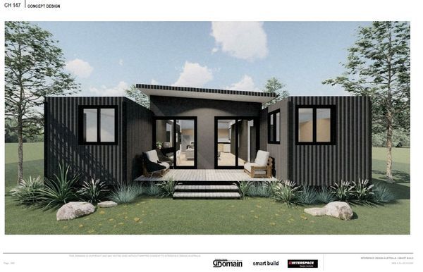 Modern black cabin exterior with angled roof, windows, and small porch.
