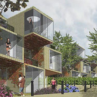 Modern modular homes with glass walls and balconies, people visible, nestled in a landscape with plants and trees.