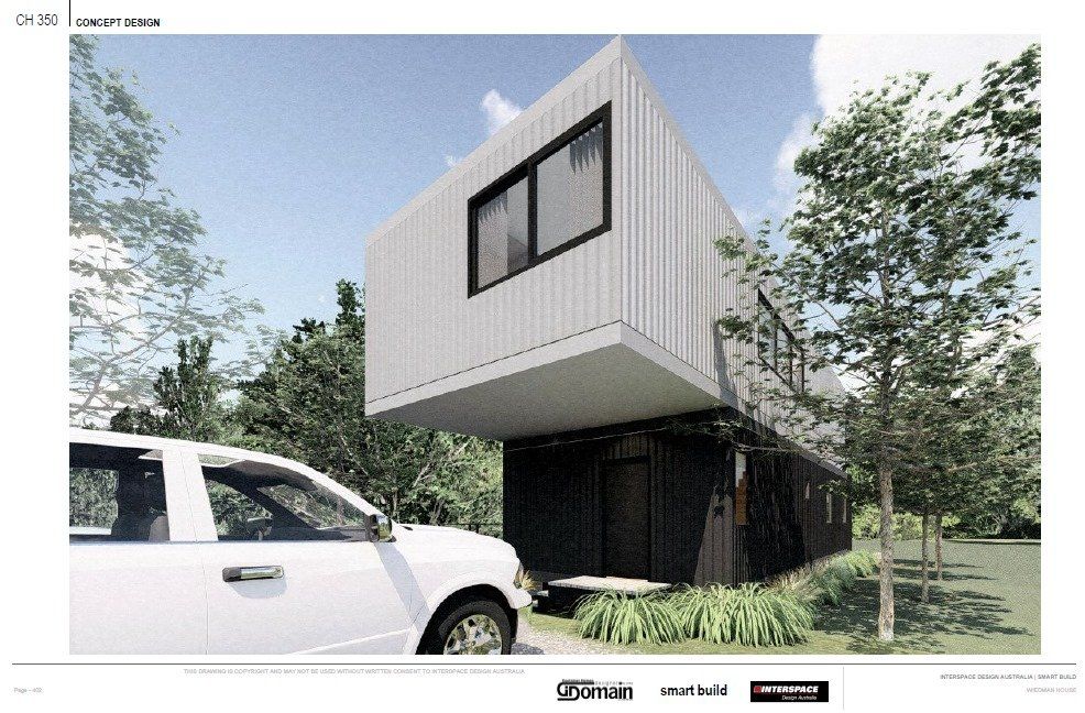 Modern two-story shipping container home. White upper level overhangs a black lower level. White car in foreground, trees surround.
