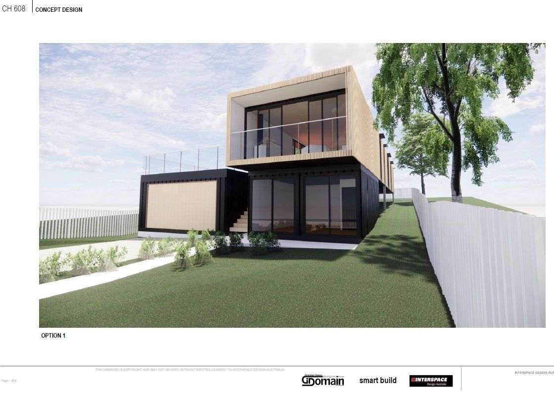 Modern two-story building with glass windows, a balcony, and a beige exterior. Located on a grassy hill with a white fence.