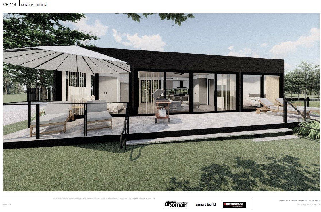 Modern house exterior with deck and glass doors, black roof and trim.