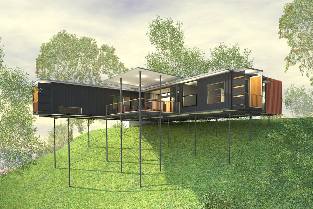 Modern home built from shipping containers, elevated on stilts on a grassy hill, with surrounding trees.
