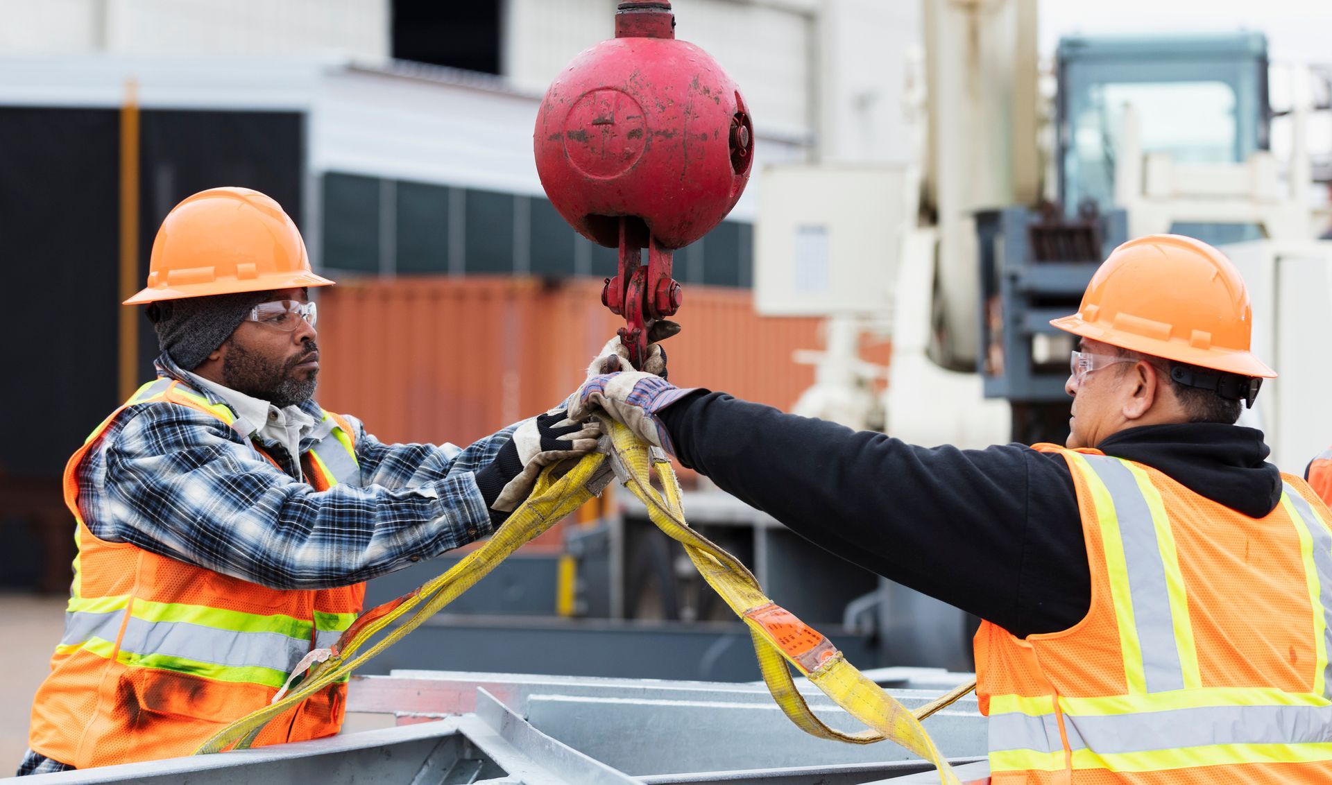 Workers with crane hook