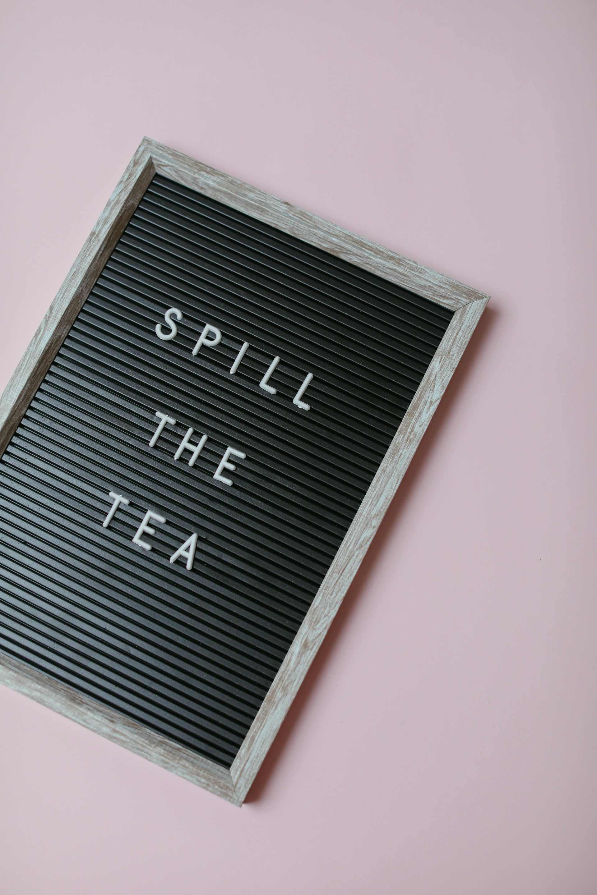 White letters on a back background saying