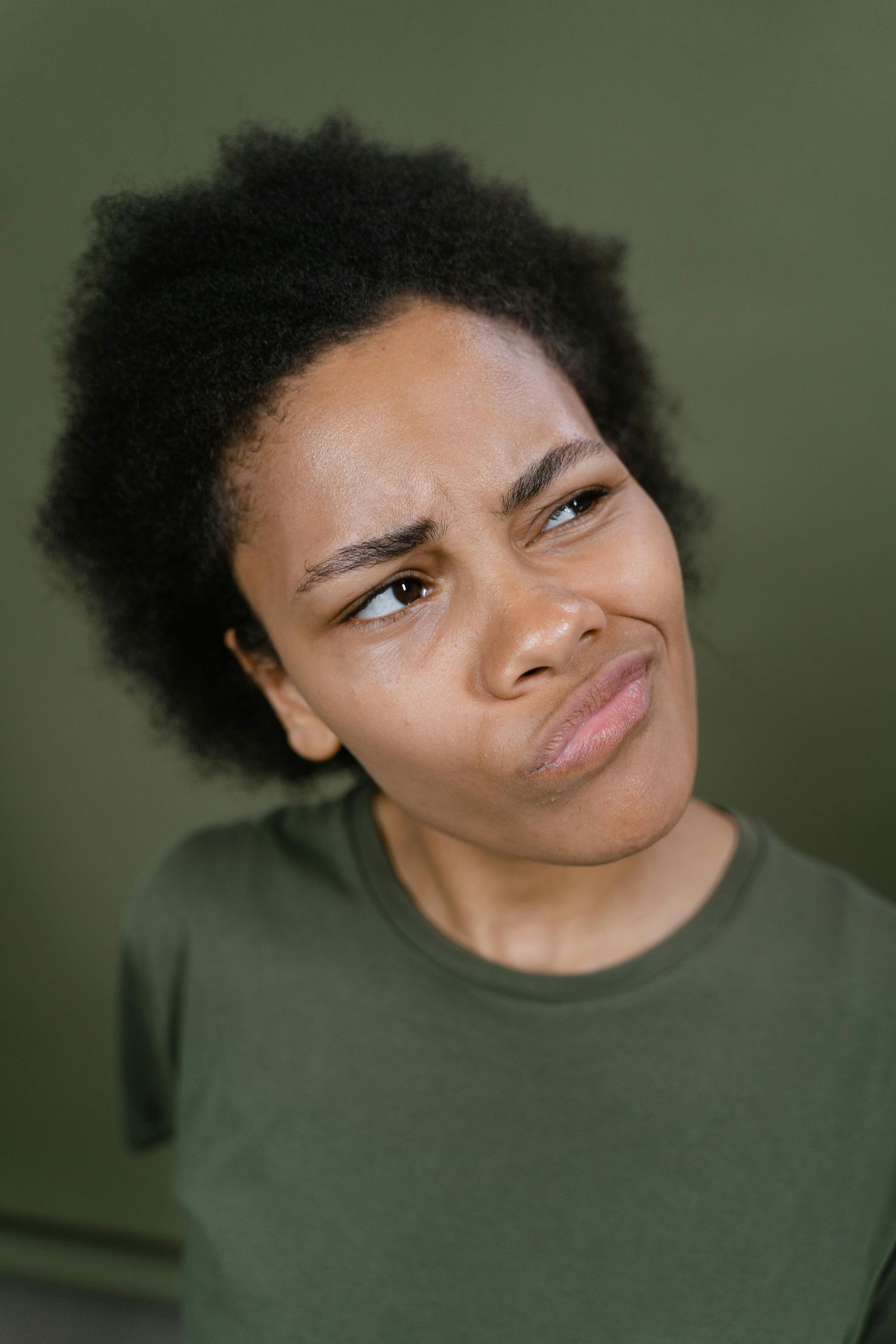 Woman with doubtful expression on her face