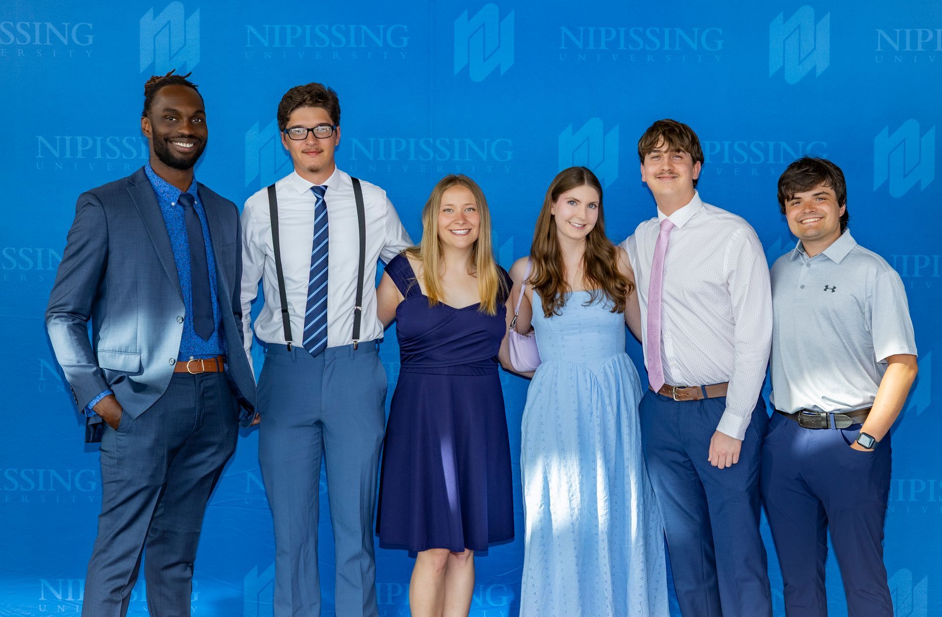 Evening at Nipissing 2026 attendees posing for a group photo. 