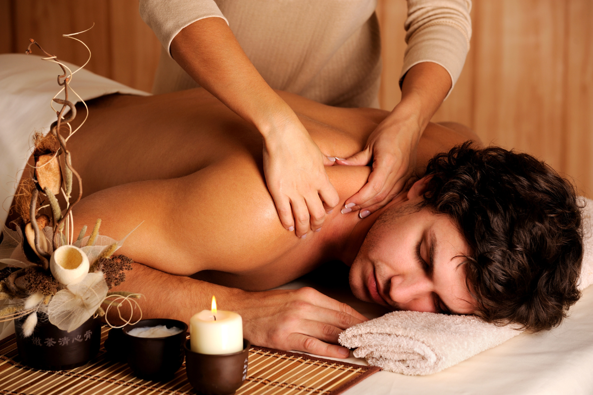 A man is getting a massage at a spa.