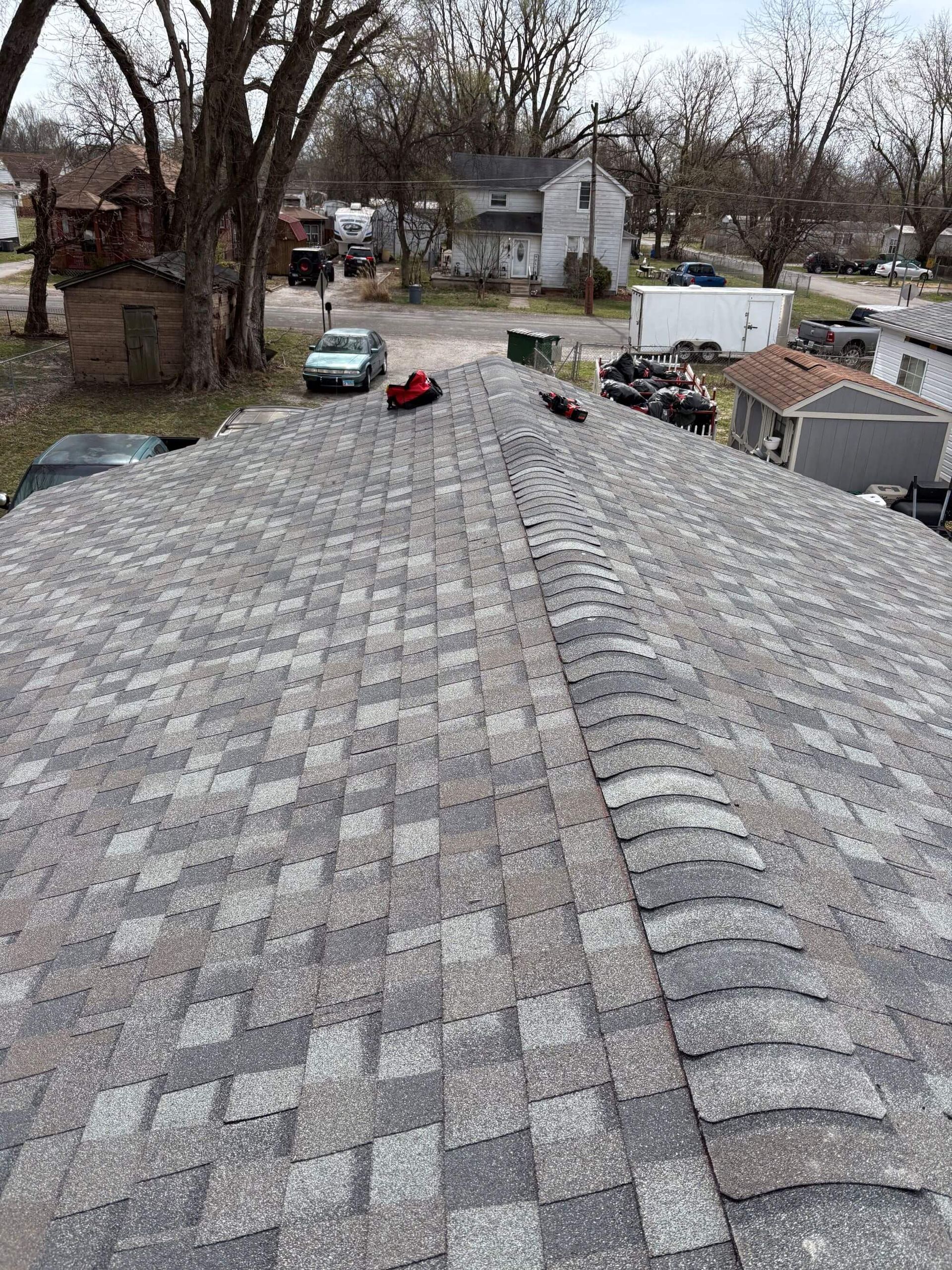 A photo of a completed roofing project performed by Fast Track Contracting