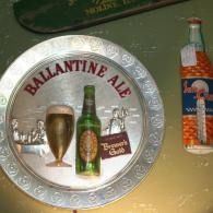 Ballantine Ale metal tray with bottle, goblet, and Club sign; orange bottle on wall at right.