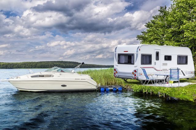Boat And RV On A Lake