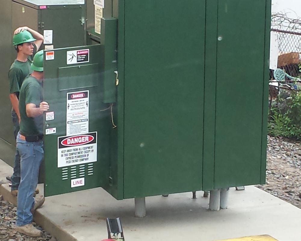 Workers Beside the Machine — Chalfont, PA — Lift Tech Crane and Rigging