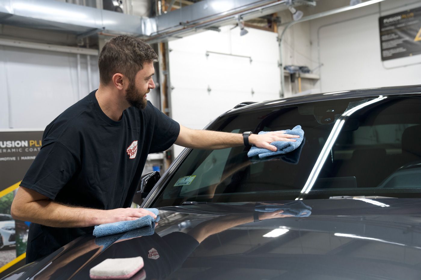 wiping windshield