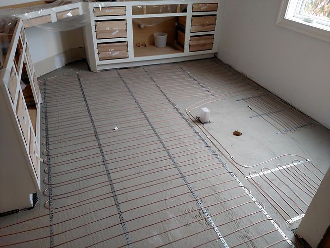 A room with a lot of wires on the floor