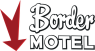 Border Motel sign with red downward arrow and black lettering