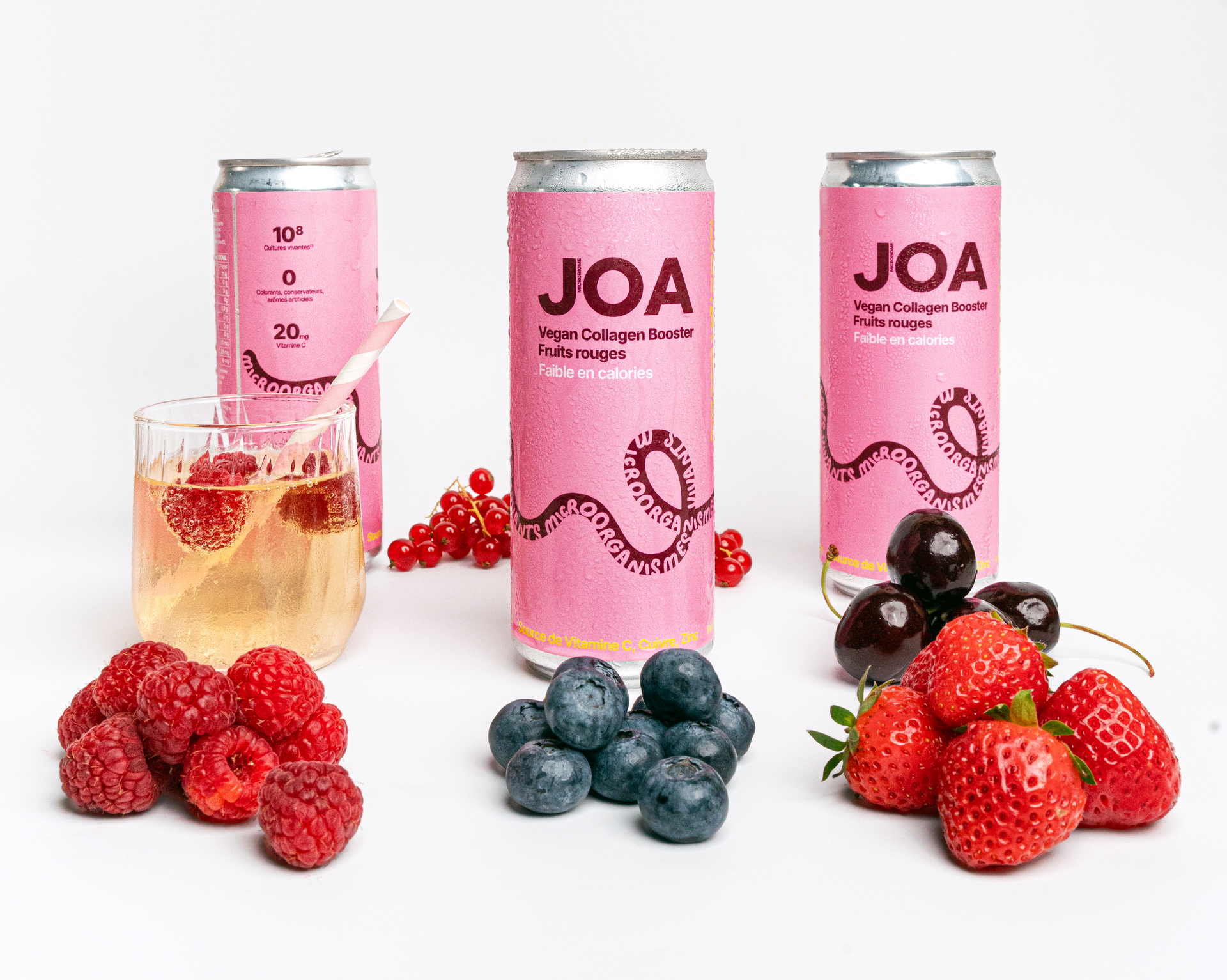 Seven colorful canned drinks in a row.