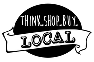 Black-and-white “Think. Shop. Buy. Local.” sign with banner and bold “LOCAL” text