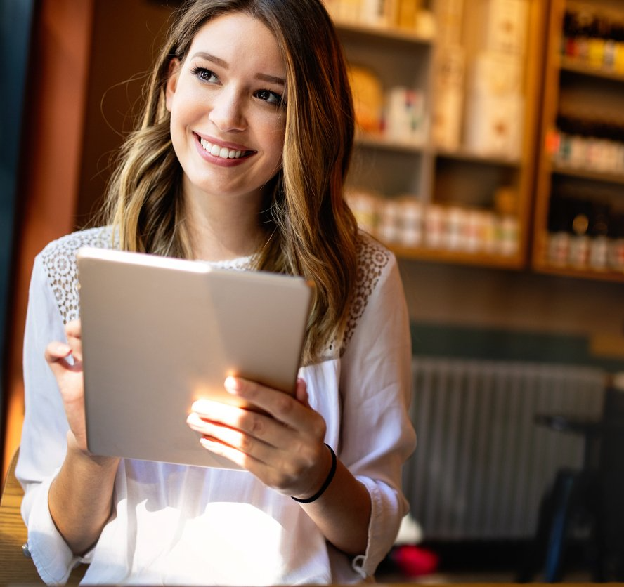 Smiling Tax Professional holding iPad
