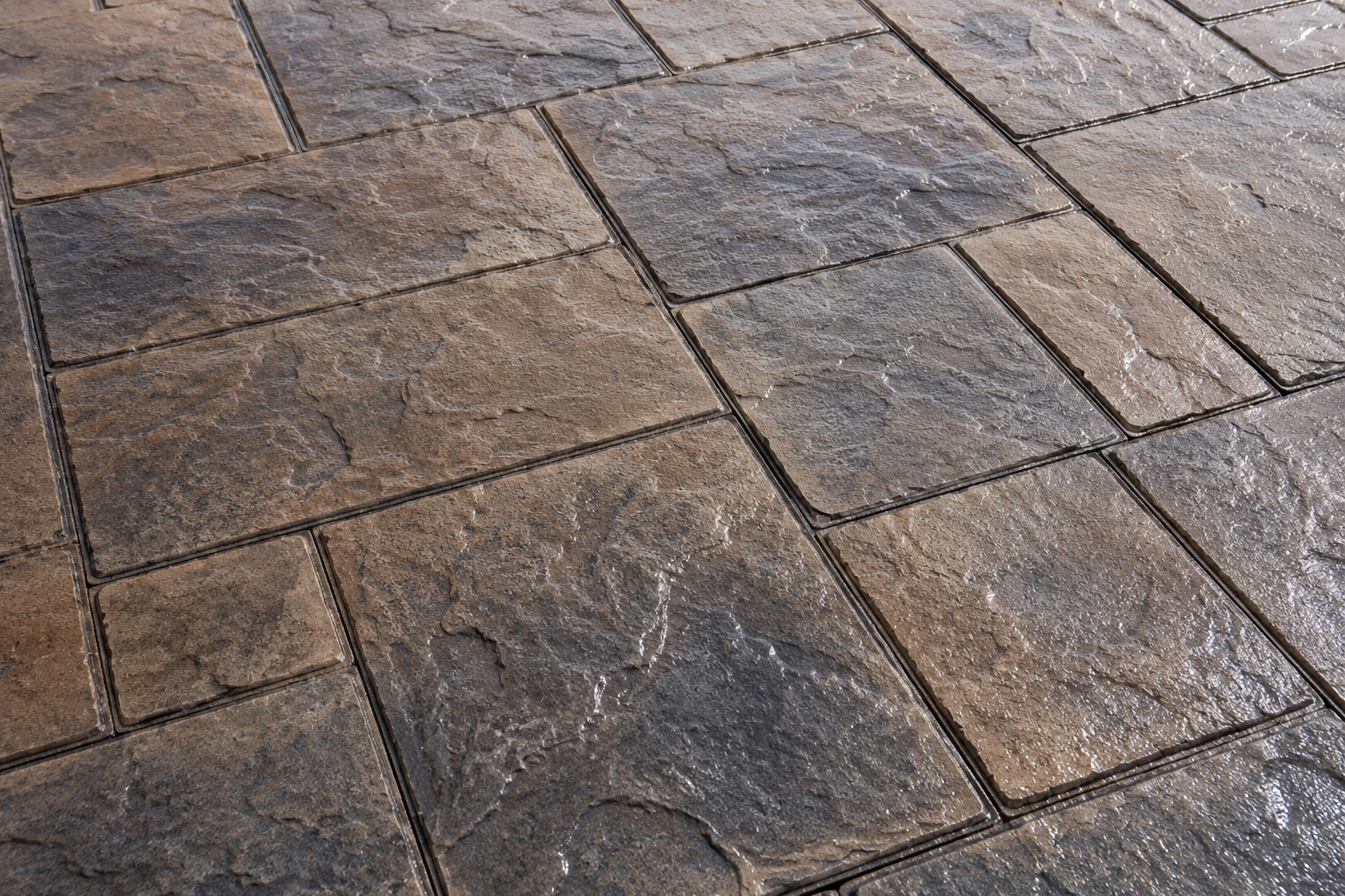 A close up view of stamped and stained concrete