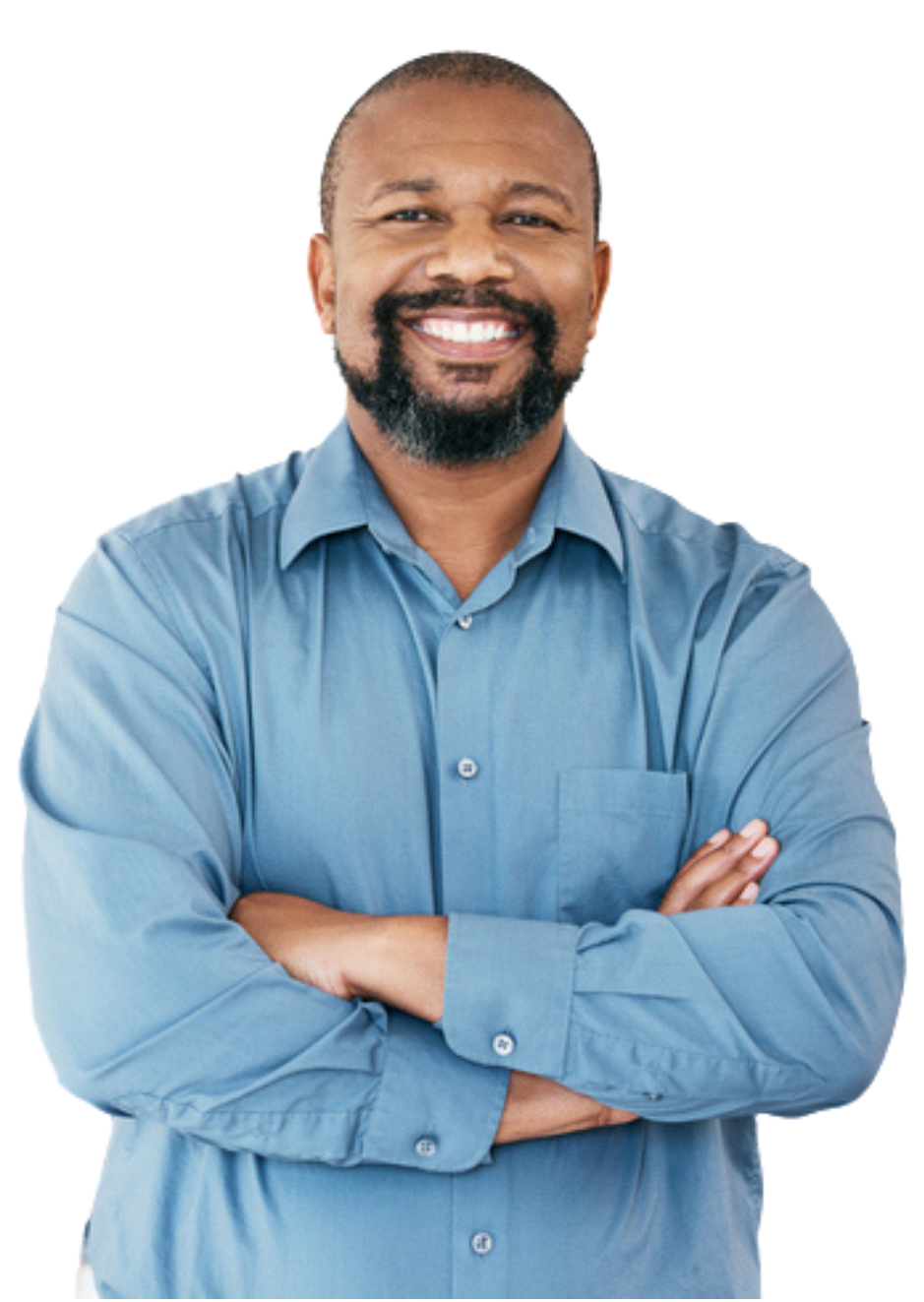 A man in a brown polo shirt is smiling with his arms crossed.