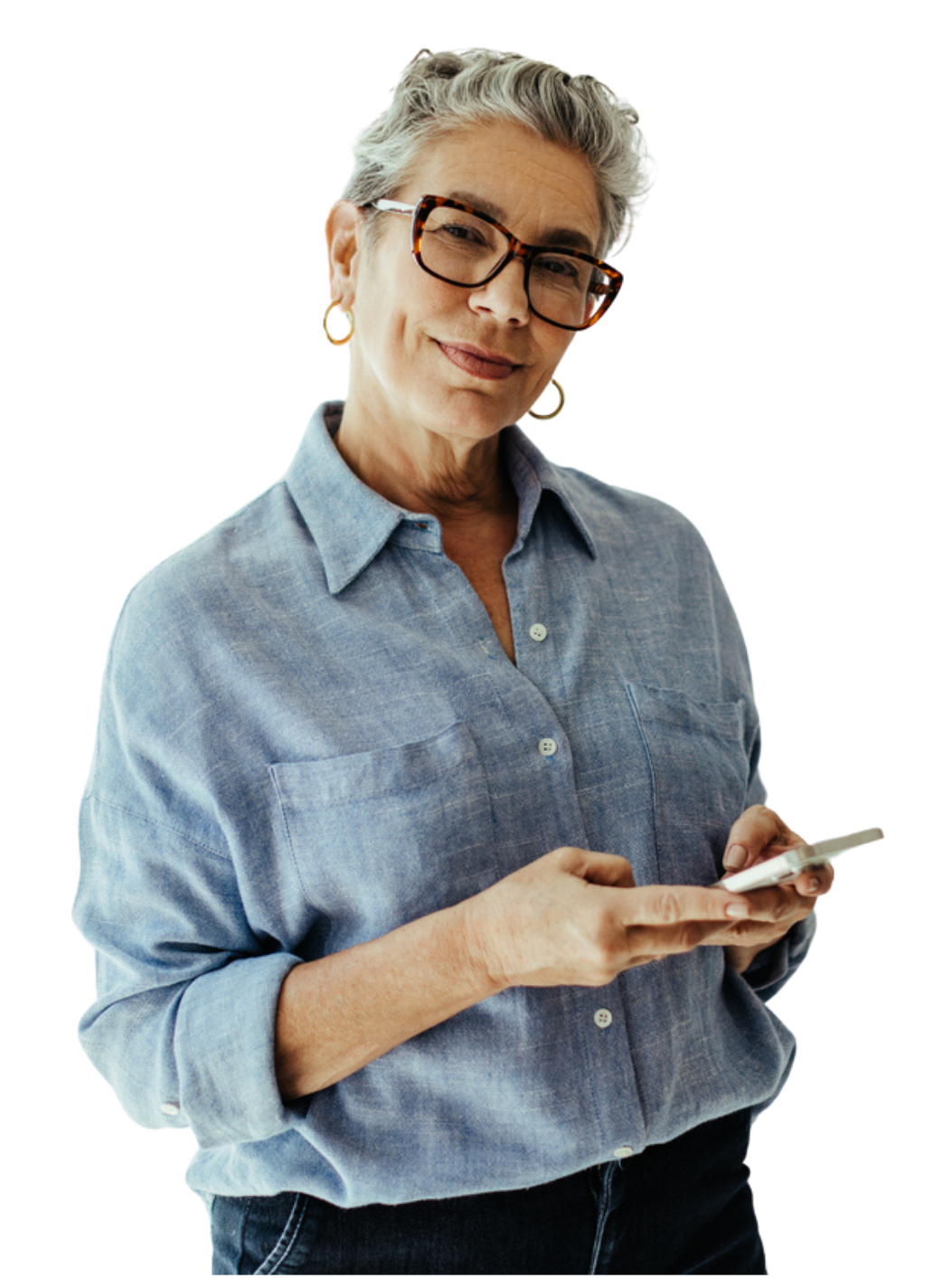 A man wearing glasses is holding a tablet in his hands
