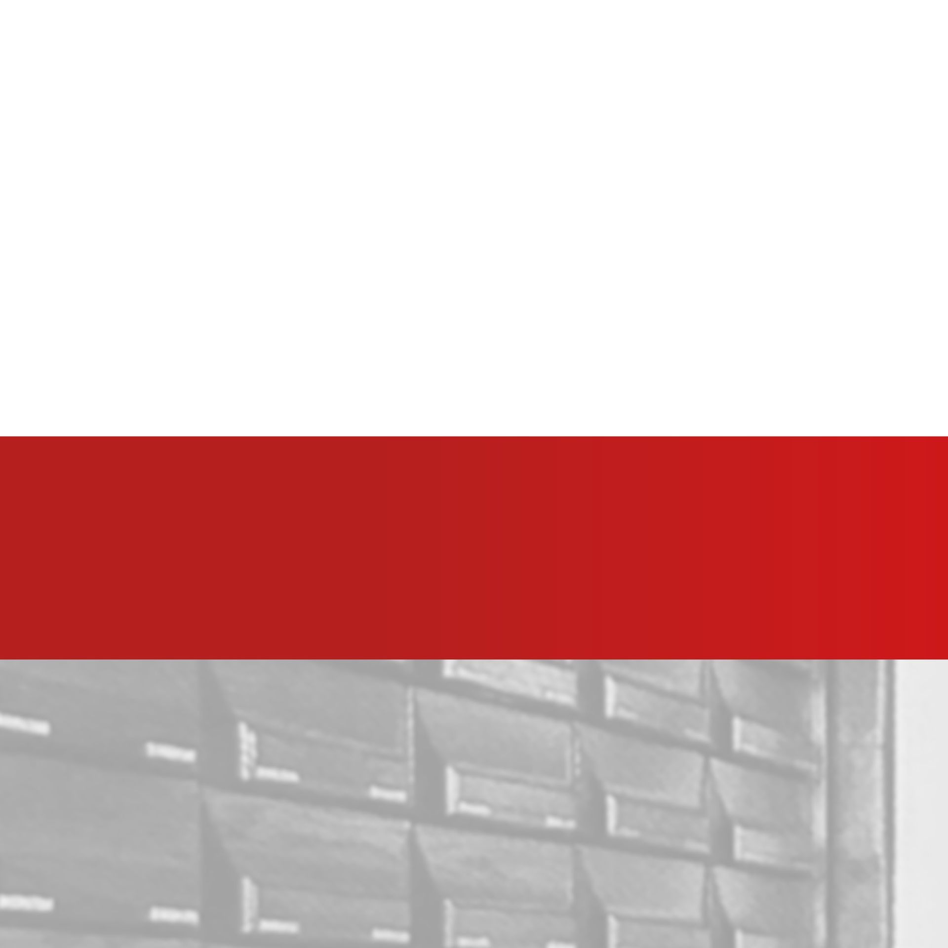 Ein rot-weiß gestreifter Hintergrund mit einer Ziegelmauer im Hintergrund.