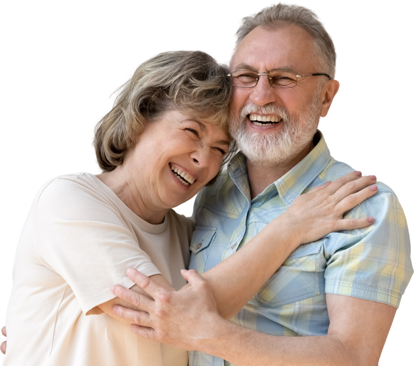 A man and a woman are hugging each other and smiling.