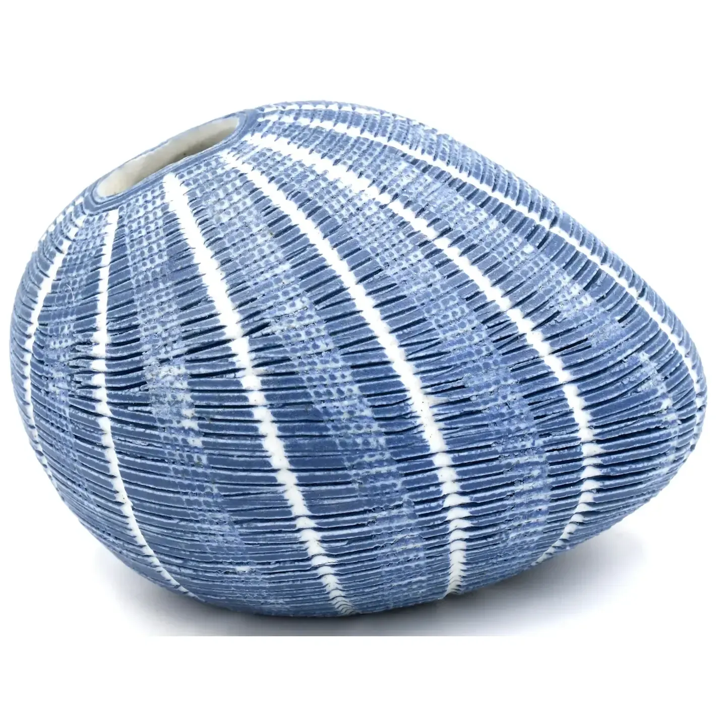 Blue and white striped decorative stone with a smooth, rounded shape on a white background