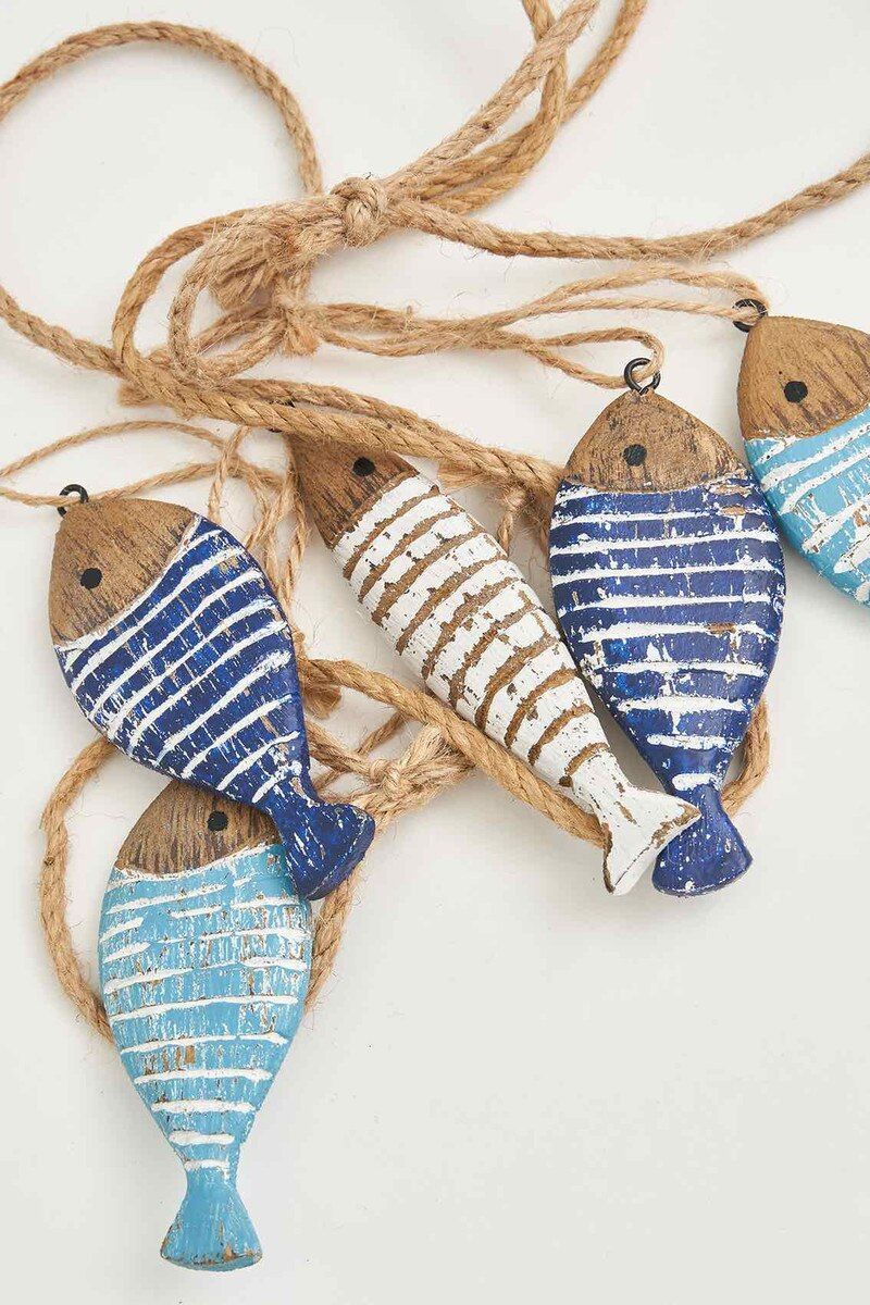 Four painted wooden fish ornaments with blue and white stripes, tied together by twine.
