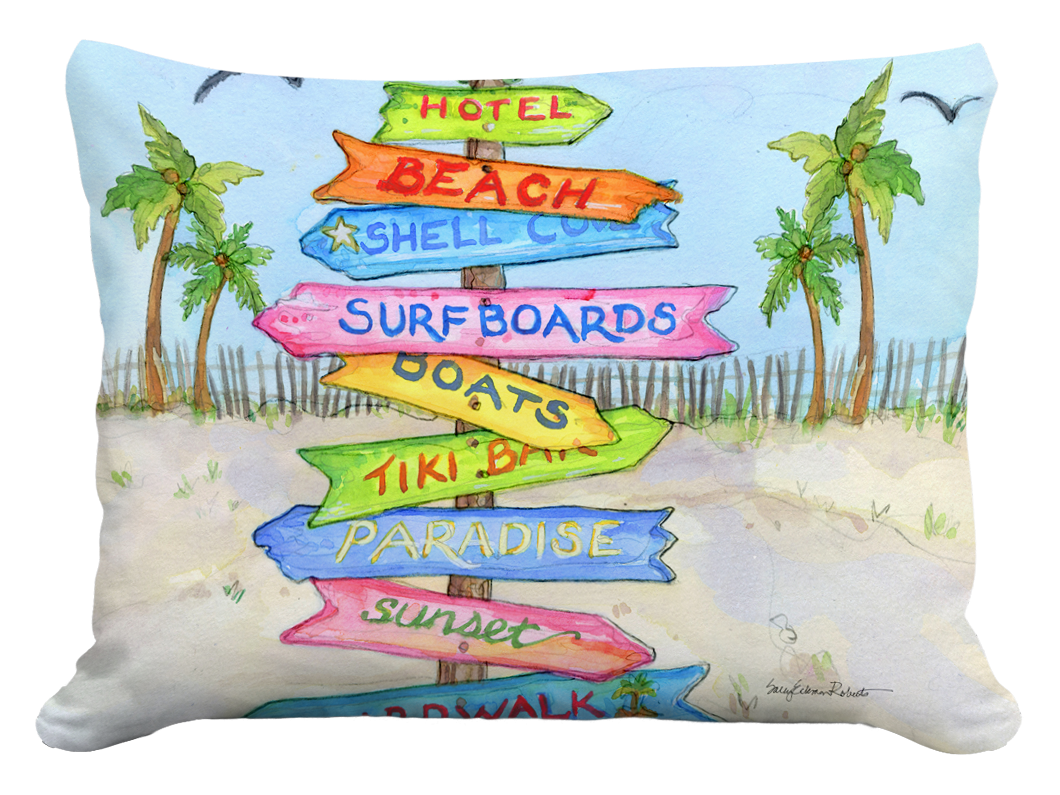 Beach signpost pillow with colorful stacked signs and palm trees on a sandy shore background